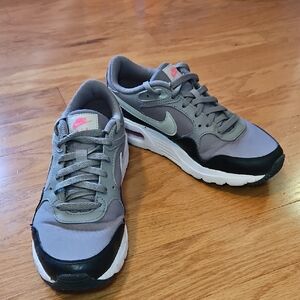 Nike Air Women's Gray and Black Sneakers with Pink Accents
